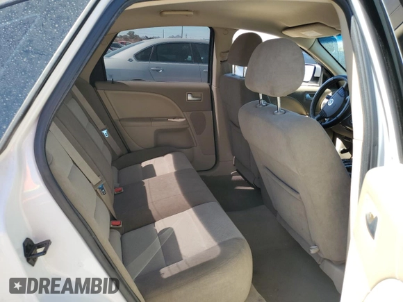2005 Mercury Montego Luxury z VIN 1MEFM40155G626347, wystawiony jako Copart lot #46715235 z przebiegiem 213 883 mil mil oraz Szkoda całkowita • Salvage title. Historia ofert i sprzedaży dostępna na DreamBid. Obrazek 10.