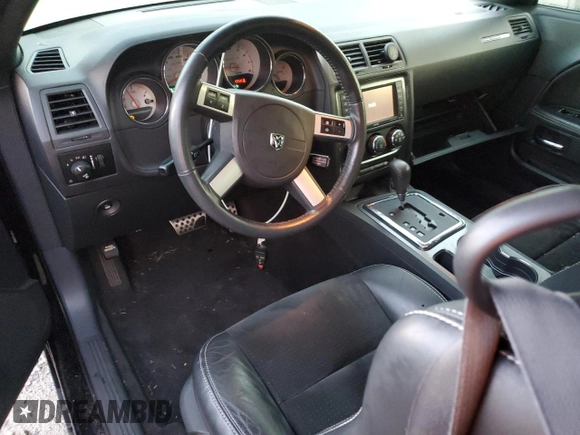 2010 Dodge Challenger SRT-8 with VIN 2B3CJ7DW8AH104011, listed as a Copart auction lot 87216334 with 55,519 mi miles and Salvage title. Bid and sale history available at DreamBid. Image 8.