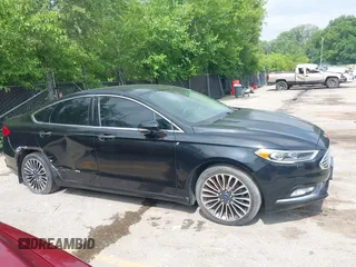 2017 Ford Fusion Titanium with VIN 3FA6P0D92HR252476, listed as a IAAI auction lot 40176942 with 88,818 mi miles and . Bid and sale history available at DreamBid. Image 13.