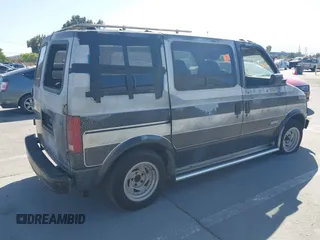 1986 Chevrolet Astro z VIN 1GCDM15Z2GB143503, wystawiony jako IAAI lot #42290965 z przebiegiem Nie podano mil oraz . Historia ofert i sprzedaży dostępna na DreamBid. Obrazek 4.