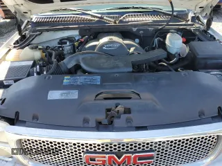 2005 GMC Yukon Denali z VIN 1GKEK63U55J143324, wystawiony jako Copart lot #59000695 z przebiegiem Nie podano mil oraz Szkoda całkowita • Salvage title. Historia ofert i sprzedaży dostępna na DreamBid. Obrazek 12.