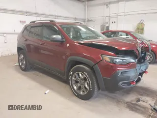 2019 Jeep Cherokee Trailhawk z VIN 1C4PJMBX0KD361981, wystawiony jako IAAI lot #42074093 z przebiegiem 56 989 mil mil oraz . Historia ofert i sprzedaży dostępna na DreamBid. Obrazek 1.