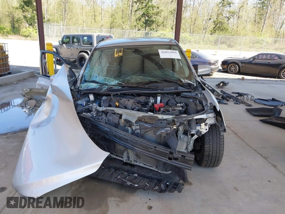 2013 Nissan Sentra S with VIN 3N1AB7AP9DL731315, listed as a IAAI auction lot 42033994 with 24,557 mi miles and . Bid and sale history available at DreamBid. Image 13.