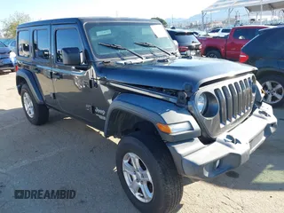 2018 Jeep Wrangler Unlimited Sport S z VIN 1C4HJXDG4JW132547, wystawiony jako IAAI lot #41838010 z przebiegiem 69 987 mil mil oraz . Historia ofert i sprzedaży dostępna na DreamBid. Obrazek 1.