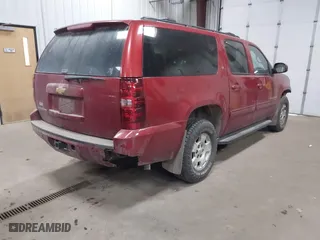 2013 Chevrolet Suburban LT with VIN 1GNSKJE76DR222890, listed as a IAAI auction lot 41698835 with 288,835 mi miles. Bid and sale history available at carsss.com. Image 4.