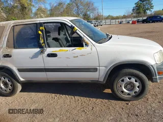 1999 Honda CR-V LX with VIN JHLRD284XXC020668, listed as a IAAI auction lot 41842024 with 224,359 mi miles. Bid and sale history available at carsss.com. Image 6.