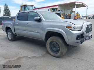 2019 Toyota Tacoma 4WD SR with VIN 3TMCZ5AN4KM194526, listed as a IAAI auction lot 42021504 with 87,767 mi miles. Bid and sale history available at carsss.com. Image 1.
