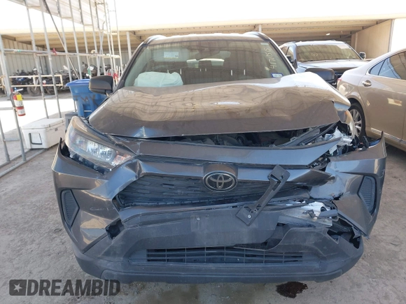 2019 Toyota RAV4 LE with VIN JTMH1RFV4KD037099, listed as a IAAI auction lot 41719515 with 56,882 mi miles. Bid and sale history available at carsss.com. Image 12.
