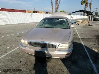 1999 Buick Park Avenue with VIN 1G4CW52K6X4653731, listed as a Copart auction lot 72736444 with 128,471 mi miles and Salvage Title. Bid and sale history available at carsss.com. Image 11.