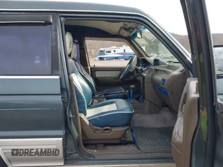 1995 Mitsubishi Montero z VIN JA4MR41H7SJ010597, wystawiony jako IAAI lot #41610885 z przebiegiem 162 406 mil mil oraz . Historia ofert i sprzedaży dostępna na DreamBid. Obrazek 5.
