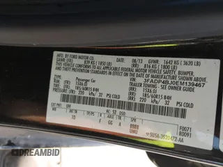 2014 Ford Fiesta SE with VIN 3FADP4BJ0EM139467, listed as a IAAI auction lot 41817437 with 45,570 mi miles and . Bid and sale history available at DreamBid. Image 9.