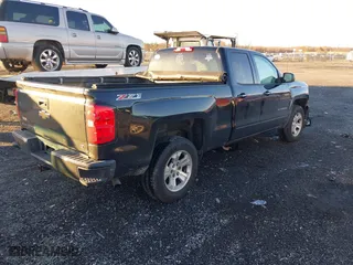 2017 Chevrolet Silverado 1500 LT with VIN 1GCVKREC8HZ331875, listed as a IAAI auction lot 40960777 with 147,157 mi miles. Bid and sale history available at carsss.com. Image 4.