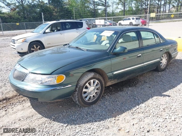 2000 Lincoln Continental with VIN 1LNHM97VXYY759969, listed as a IAAI auction lot 41892082 with 114389 miles. Bid and sale history available at carsss.com. Image 2.
