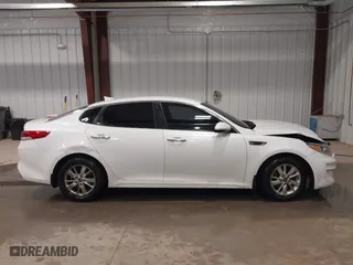 2016 Kia Optima LX with VIN KNAGT4L30G5072605, listed as a IAAI auction lot 41562330 with 152,320 mi miles. Bid and sale history available at carsss.com. Image 13.