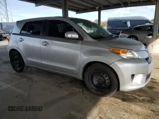 2012 Scion xD with VIN JTKKU4B45C1023933, listed as a Copart auction lot 49886585 with 206,421 mi miles and Salvage Title. Bid and sale history available at DreamBid. Image 4.