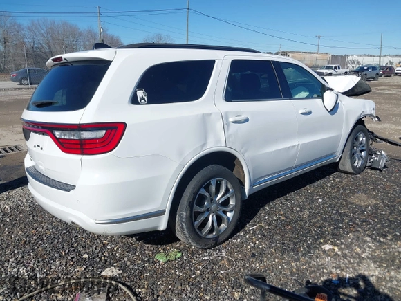 2018 Dodge Durango SXT with VIN 1C4RDJAG5JC292175, listed as a IAAI auction lot 41241290 with 129,677 mi miles and . Bid and sale history available at DreamBid. Image 4.