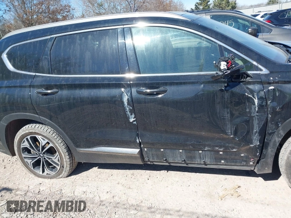 2019 Hyundai Santa Fe Ultimate with VIN 5NMS5CAA6KH075047, listed as a IAAI auction lot 41802407 with 119,063 mi miles and . Bid and sale history available at DreamBid. Image 13.