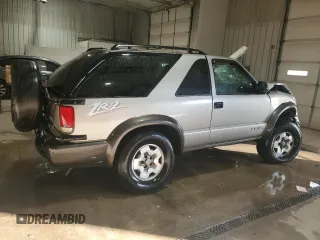 2004 Chevrolet Blazer LS z VIN 1GNCT18X34K143280, wystawiony jako Copart lot #50494785 z przebiegiem Nie podano mil oraz Szkoda całkowita • Salvage title. Historia ofert i sprzedaży dostępna na DreamBid. Obrazek 3.