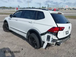 2022 Volkswagen Tiguan SE R-Line Black z VIN 3VVCB7AX5NM007401, wystawiony jako IAAI lot #41630458 z przebiegiem 55 635 mil mil oraz . Historia ofert i sprzedaży dostępna na DreamBid. Obrazek 3.
