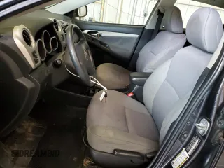2009 Toyota Matrix S with VIN 2T1LE40E79C011596, listed as a Copart auction lot 60873695 with 207,692 mi miles and Salvage title. Bid and sale history available at DreamBid. Image 7.