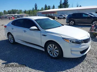 2016 Kia Optima LX z VIN 5XXGT4L30GG059268, wystawiony jako IAAI lot #42449837 z przebiegiem 170 640 mil mil oraz . Historia ofert i sprzedaży dostępna na DreamBid. Obrazek 1.