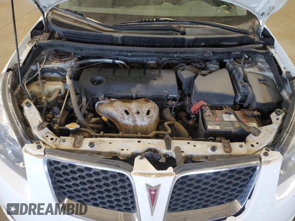 2010 Pontiac Vibe z VIN 5Y2SM6E03AZ420535, wystawiony jako Copart lot #55619275 z przebiegiem 172 026 mil mil oraz Czysty tytuł • Clean title. Historia ofert i sprzedaży dostępna na DreamBid. Obrazek 11.