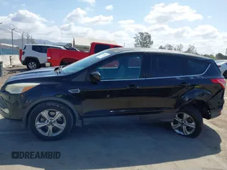 2015 Ford Escape SE with VIN 1FMCU0G91FUA18588, listed as a IAAI auction lot 41958047 with 111,523 mi miles. Bid and sale history available at carsss.com. Image 14.