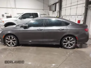 2015 Chrysler 200 C with VIN 1C3CCCCG1FN551259, listed as a IAAI auction lot 41221979 with 98,055 mi miles and . Bid and sale history available at carsss.com. Image 14.