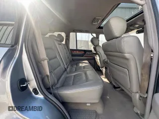 2003 Lexus LX 470 z VIN JTJHT00W933535214, wystawiony jako Copart lot #62037495 z przebiegiem 373 210 mil mil oraz Czysty tytuł • Clean title. Historia ofert i sprzedaży dostępna na DreamBid. Obrazek 6.
