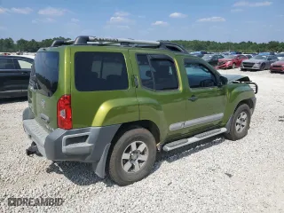 2011 Nissan Xterra Pro-4X with VIN 5N1AN0NW6BC523782, listed as a Copart auction lot 69386664 with 105,606 mi miles and Salvage Title. Bid and sale history available at carsss.com. Image 3.