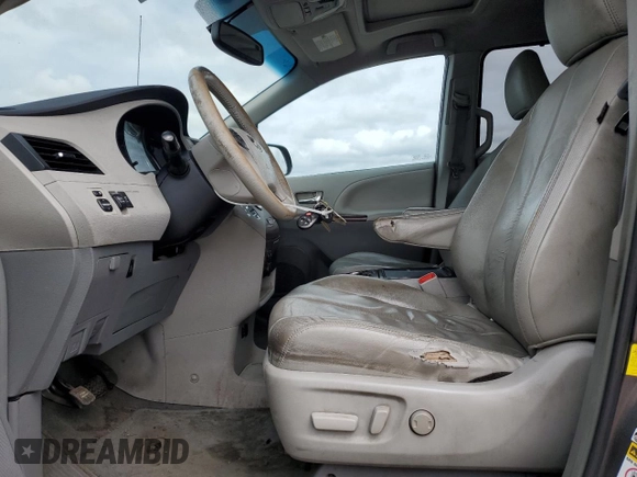 2012 Toyota Sienna XLE with VIN 5TDDK3DC2CS038316, listed as a Copart auction lot 52694245 with 273,415 mi miles and Clean Title. Bid and sale history available at DreamBid. Image 7.