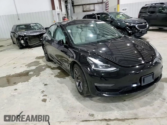 2021 Tesla Model 3 Long Range z VIN 5YJ3E1EB8MF048996, wystawiony jako Copart lot #57501495 z przebiegiem 45 952 mil mil oraz Szkoda całkowita • Salvage title. Historia ofert i sprzedaży dostępna na DreamBid. Obrazek 13.