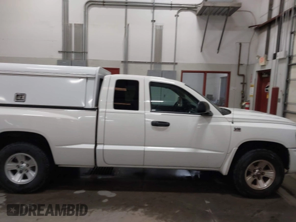 2009 Dodge Dakota Bighorn/Lonestar with VIN 1D3HW32P79S819674, listed as a IAAI auction lot 41962369 with 157,399 mi miles and . Bid and sale history available at carsss.com. Image 14.