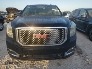 2015 GMC Yukon Denali with VIN 1GKS2CKJ5FR529091, listed as a Copart auction lot 77325934 with 0 mi miles and Clean Title. Bid and sale history available at carsss.com. Image 5.