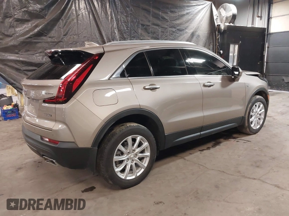 2023 Cadillac XT4 AWD Luxury with VIN 1GYFZBR48PF174059, listed as a IAAI auction lot 41505630 with 4,757 mi miles. Bid and sale history available at carsss.com. Image 4.