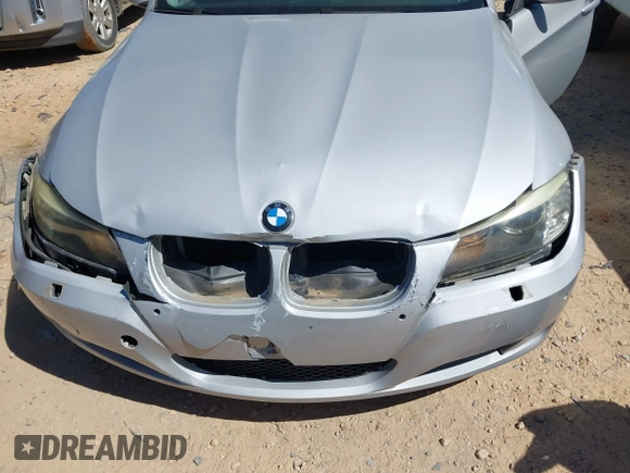 2009 BMW 3 Series 328i with VIN WBAPH77599NM30026, listed as a IAAI auction lot 41790508 with 129,498 mi miles. Bid and sale history available at carsss.com. Image 6.