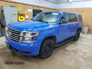 2019 Chevrolet Tahoe Commercial with VIN 1GNSKDEC9KR402957, listed as a Copart auction lot 55945195 with 124,276 mi miles and Clean title. Bid and sale history available at DreamBid. Image 1.