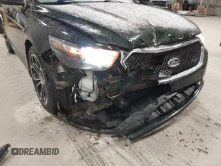 2013 Ford Taurus SHO z VIN 1FAHP2KT8DG142620, wystawiony jako IAAI lot #41800583 z przebiegiem 175 812 mil mil oraz . Historia ofert i sprzedaży dostępna na DreamBid. Obrazek 6.