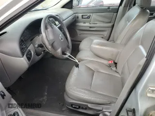 2000 Mercury Sable LS Premium z VIN 1MEFM55S2YG615740, wystawiony jako Copart lot #51266595 z przebiegiem 143 060 mil mil oraz Szkody całkowita. Historia ofert i sprzedaży dostępna na DreamBid. Obrazek 7.