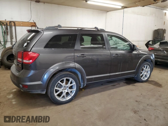 2015 Dodge Journey SXT with VIN 3C4PDCCG9FT722284, listed as a Copart auction lot 84937724 with 210,747 mi miles and Salvage title. Bid and sale history available at DreamBid. Image 3.