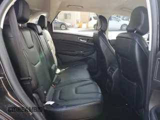 2015 Ford Edge Titanium z VIN 2FMTK4K88FBB56310, wystawiony jako Copart lot #53851524 z przebiegiem 170 380 mil mil oraz Szkody całkowita. Historia ofert i sprzedaży dostępna na DreamBid. Obrazek 11.