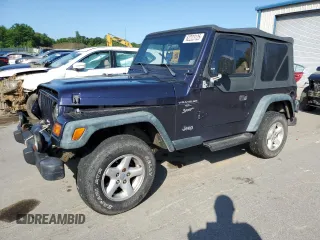 1999 Jeep Wrangler Sport with VIN 1J4FY19S6XP445867, listed as a Copart auction lot 62223125 with 146,037 mi miles and Salvage title. Bid and sale history available at DreamBid. Image 1.