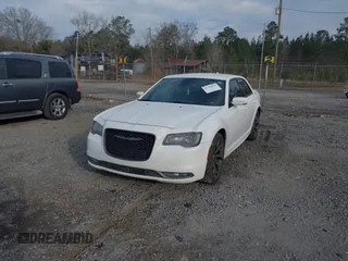 2016 Chrysler 300 with VIN 2C3CCABTXGH328909, listed as a IAAI auction lot 41788815 with 106,088 mi miles. Bid and sale history available at carsss.com. Image 2.