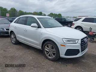2018 Audi Q3 Premium Plus z VIN WA1JCCFSXJR019670, wystawiony jako IAAI lot #42264157 z przebiegiem 75 564 mil mil oraz . Historia ofert i sprzedaży dostępna na DreamBid. Obrazek 1.
