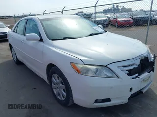 2007 Toyota Camry LE with VIN JTNBK46K973018732, listed as a IAAI auction lot 42000392 with 263,788 mi miles and . Bid and sale history available at DreamBid. Image 1.