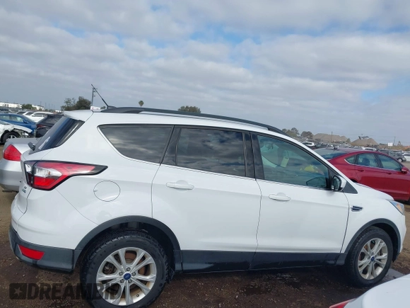 2017 Ford Escape SE with VIN 1FMCU9GD3HUD95726, listed as a IAAI auction lot 42121586 with 96,048 mi miles. Bid and sale history available at carsss.com. Image 13.
