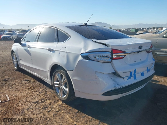 2018 Ford Fusion Hybrid S with VIN 3FA6P0UU0JR204324, listed as a IAAI auction lot 41312303 with 100,527 mi miles. Bid and sale history available at carsss.com. Image 3.