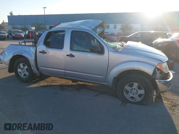 2006 Nissan Frontier SE z VIN 1N6AD07W66C470766, wystawiony jako IAAI lot #41023377 z przebiegiem Nie podano mil oraz . Historia ofert i sprzedaży dostępna na DreamBid. Obrazek 14.