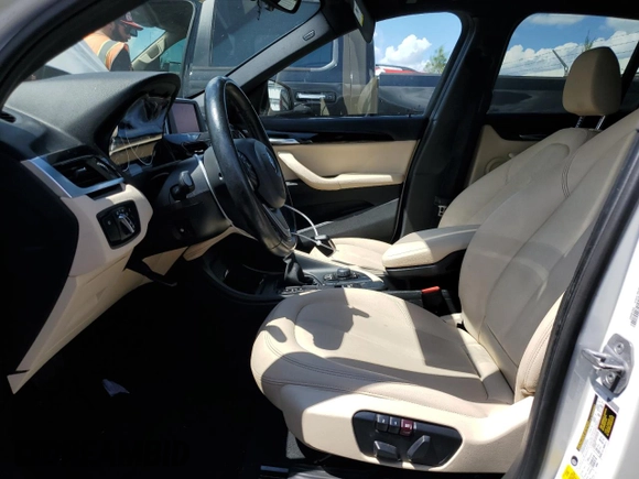 2018 BMW X1 sDrive28i with VIN WBXHU7C36J5H42760, listed as a Copart auction lot 49616663 with 89,603 mi miles and . Bid and sale history available at DreamBid. Image 7.