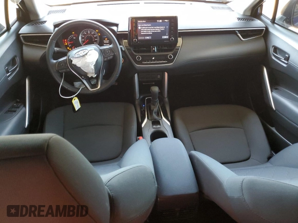 2022 Toyota Corolla Cross LE with VIN 7MUCAAAG6NV021103, listed as a Copart auction lot 56882015 with 21,769 mi miles and Salvage title. Bid and sale history available at DreamBid. Image 8.